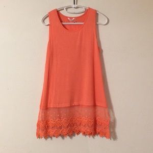 Women’s size L sleeveless, coral-colored tunic